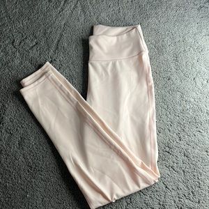 light pink stretchy leggings in a size medium!